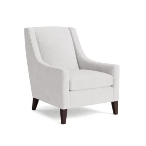 Elegant fabric Wingback Accent Chair Dubai with supportive backrest and contemporary wooden leg design.