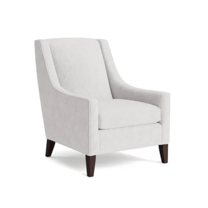 Elegant fabric Wingback Accent Chair Dubai with supportive backrest and contemporary wooden leg design.