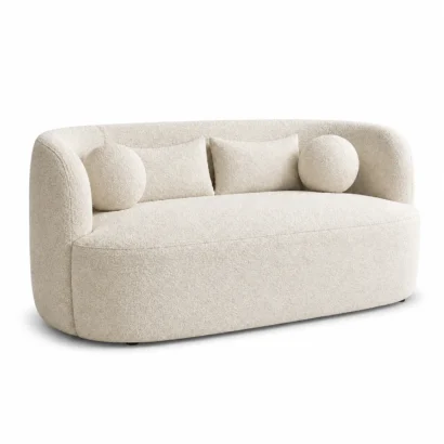 Premium curved 2-seater performance sofa with cream bouclé upholstery designed for elegant UAE interiors.