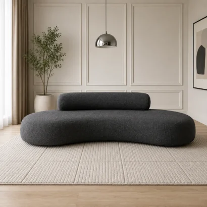 Dark Grey Curved Sofa with curved profile, premium textured fabric, and exceptional comfort in Dubai.