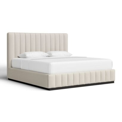 Cream upholstered queen bed frame with ribbed headboard and dark wood base.
