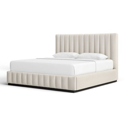 Minimalist platform bed with vertical stitching and white bedding.
