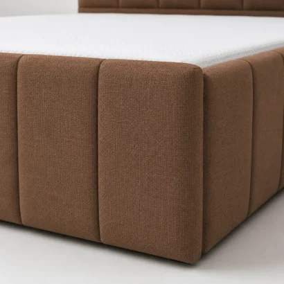 Space-saving Storage Bed Frame with premium fabric upholstery, perfect for luxury bedroom interiors in Dubai and the UAE.