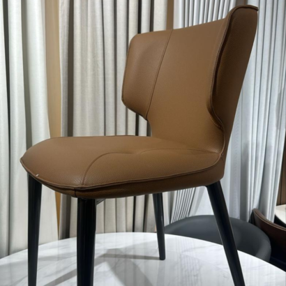 Wingback brown finish dining chair for Downtown Dubai apartments
