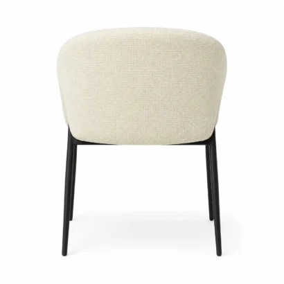 Back view of cream bouclé dining chair with rounded upholstered back and black legs