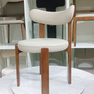 Mid-century modern 3-legged wooden accent chair.