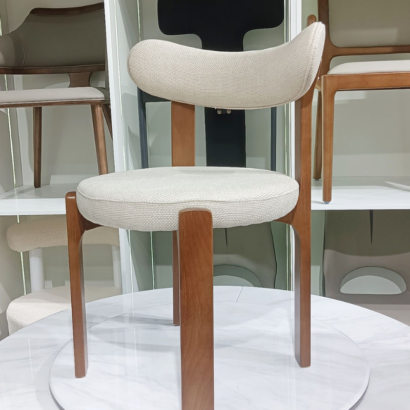 Mid-century modern 3-legged wooden accent chair.