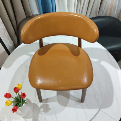 Tapered legs in a rich walnut finish.