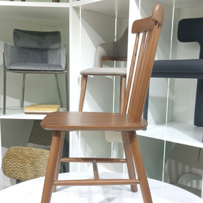 Ansary Furniture Windsor-style brown wooden chair.