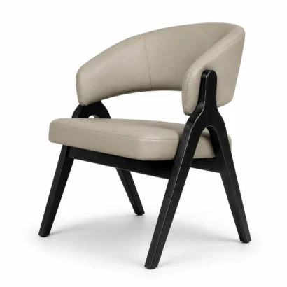 Beige upholstered dining chair with black wooden legs, front right angle view