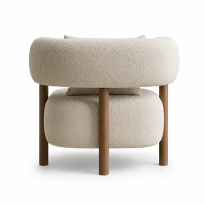 Scandinavian bouclé accent chair back view with curved upholstered backrest