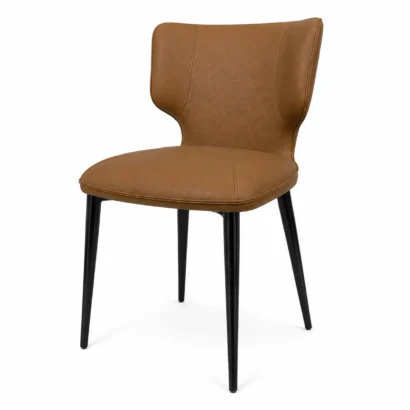 3/4 view of a brown upholstered dining chair with black metal legs