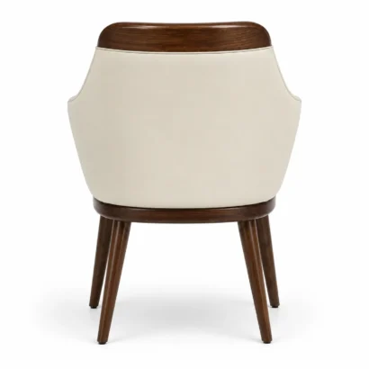 Back view of cream faux leather dining chair with walnut wood frame and legs