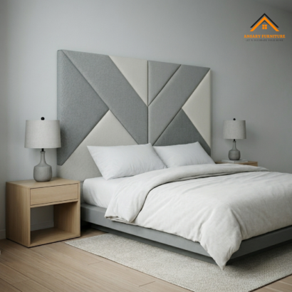 Geometric upholstered panel bed in Dubai by Ansary Furniture with luxury grey fabric headboard.