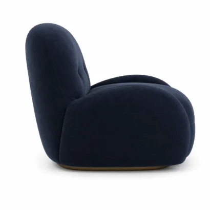 Luxury curved accent chair styled in an elegant modern living room