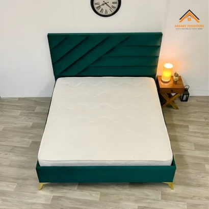 Luxury teal upholstered bed in Dubai with elegant fabric finish