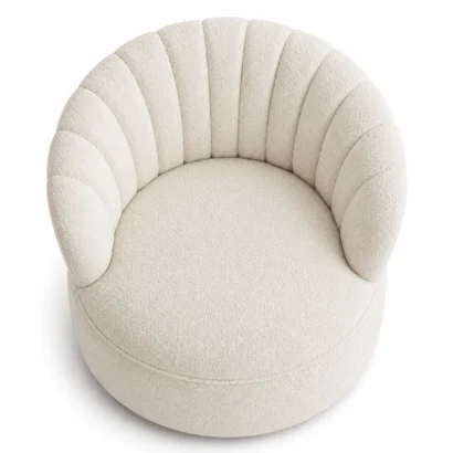 Top view of modern bouclé accent chair showing curved seating and textured fabric