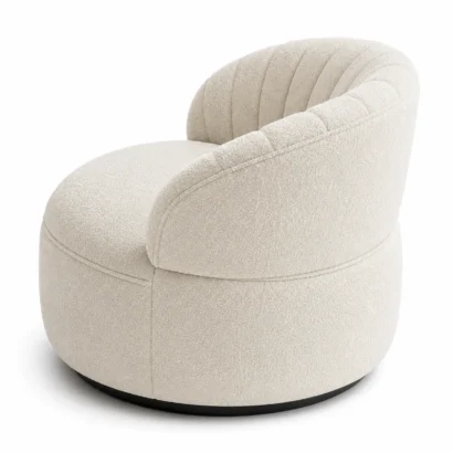 Modern bouclé accent chair with rounded back shown from the rear right