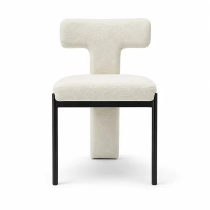 Modern T-back designer dining chair front view with cream upholstery and black metal legs
