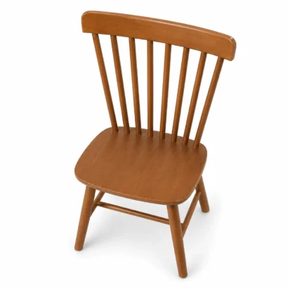 Top-angle view of Rowan spindle-back dining chair with smooth wooden seat
