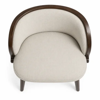 Upholstered barrel dining chair with rounded backrest and comfortable cream seat