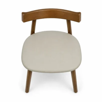 Left side view of a wooden dining chair with curved backrest and beige upholstered seat in UAE
