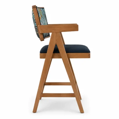 Top-angle view of a wooden dining chair with upholstered navy seat