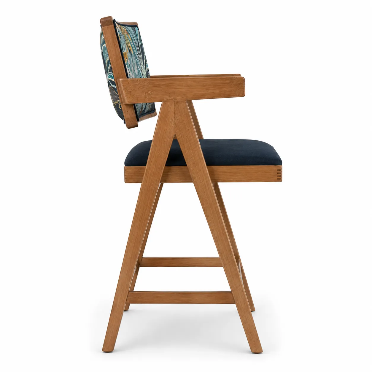 Top-angle view of a wooden dining chair with upholstered navy seat