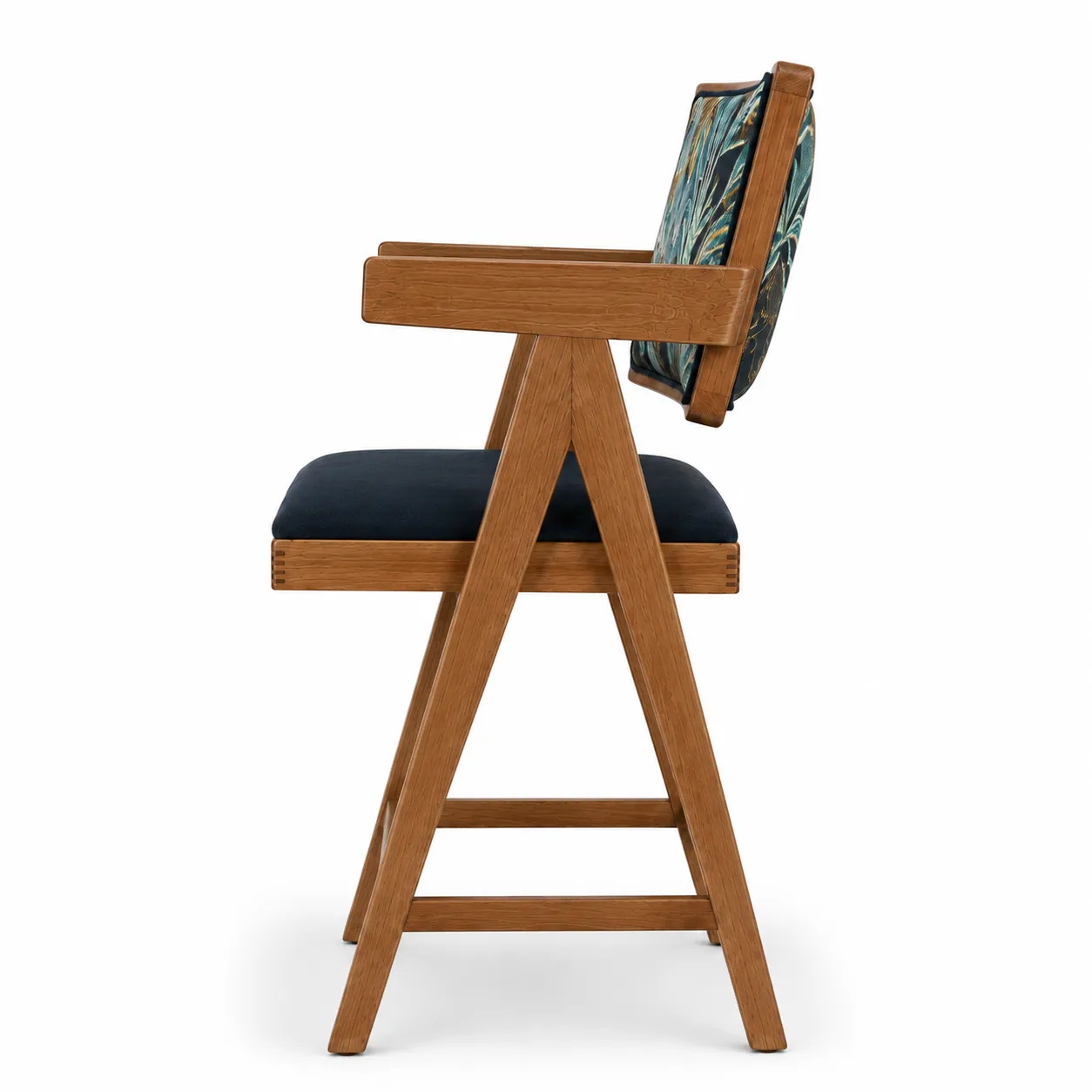 Side view of a wooden dining chair with upholstered seat and backrest