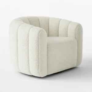 White bouclé swivel accent chair with curved barrel design by Ansary Furniture.