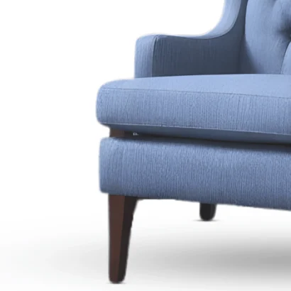 Classic wingback lounge chair with button tufting for stylish UAE interiors