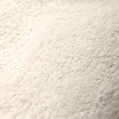Luxury modern upholstered bed featuring soft texture bouclé fabric for contemporary Dubai bedrooms