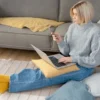Buy Furniture Online UAE - Customer comparing modern furniture online before purchasing a sofa for a contemporary living room