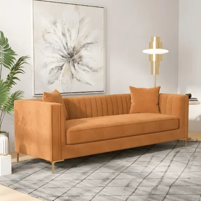 Stylish orange channel-tufted sofa for villas and apartments UAE