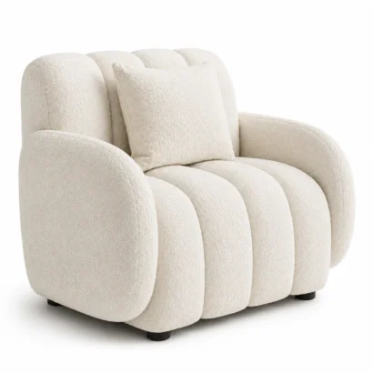 Modern white bouclé club chair in a front left three-quarter view