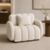 White bouclé club chair styled in a modern luxury living room in UAE Living Room Furniture Dubai
