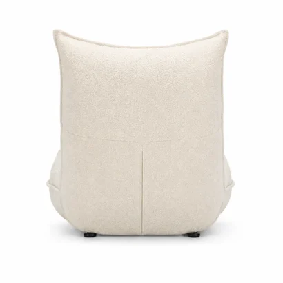Cream bouclé lounge chair back view with detailed upholstery and curved silhouette
