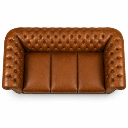 Signature leather sofa top view showing detailed leather upholstery and tufting