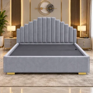 Grey stepped upholstered platform bed styled in a contemporary bedroom