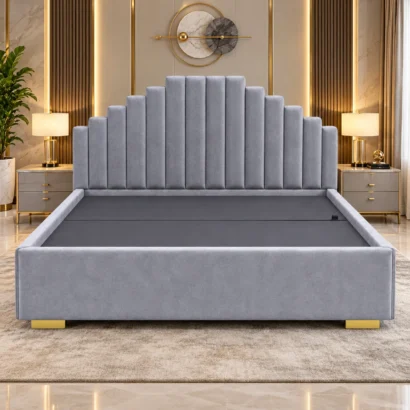 Grey stepped upholstered platform bed styled in a contemporary bedroom